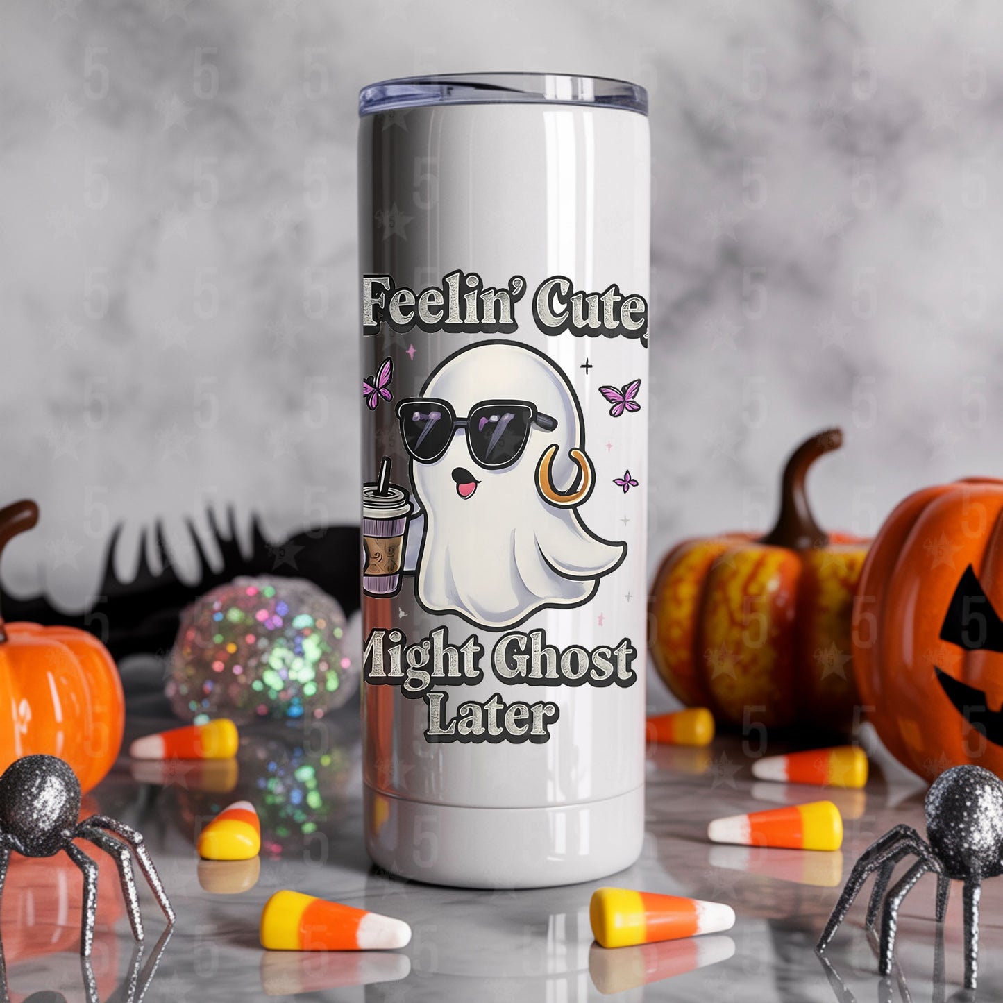 Tumbler with ghost design and Halloween-themed text on a gray background with pumpkins and candy corn.