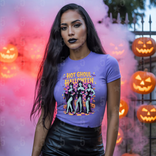 latina woman in lavender shirt and leather skirt in front of an iron gate decorated with  pumpkins