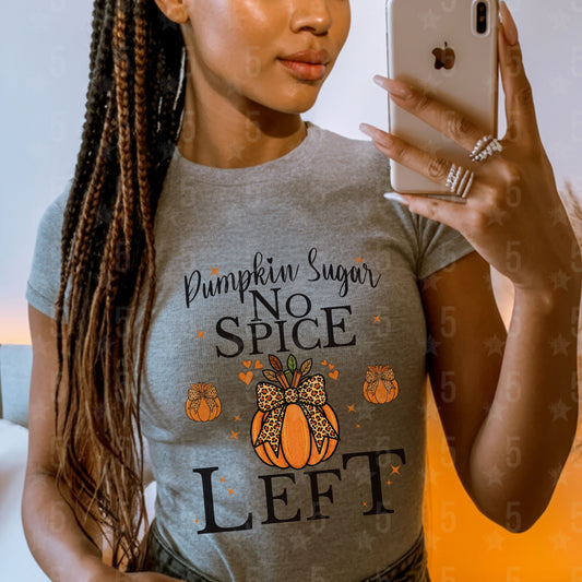 Person wearing a gray t-shirt with 'Pumpkin Sugar No Spice Left' text and taking a mirror selfie.
