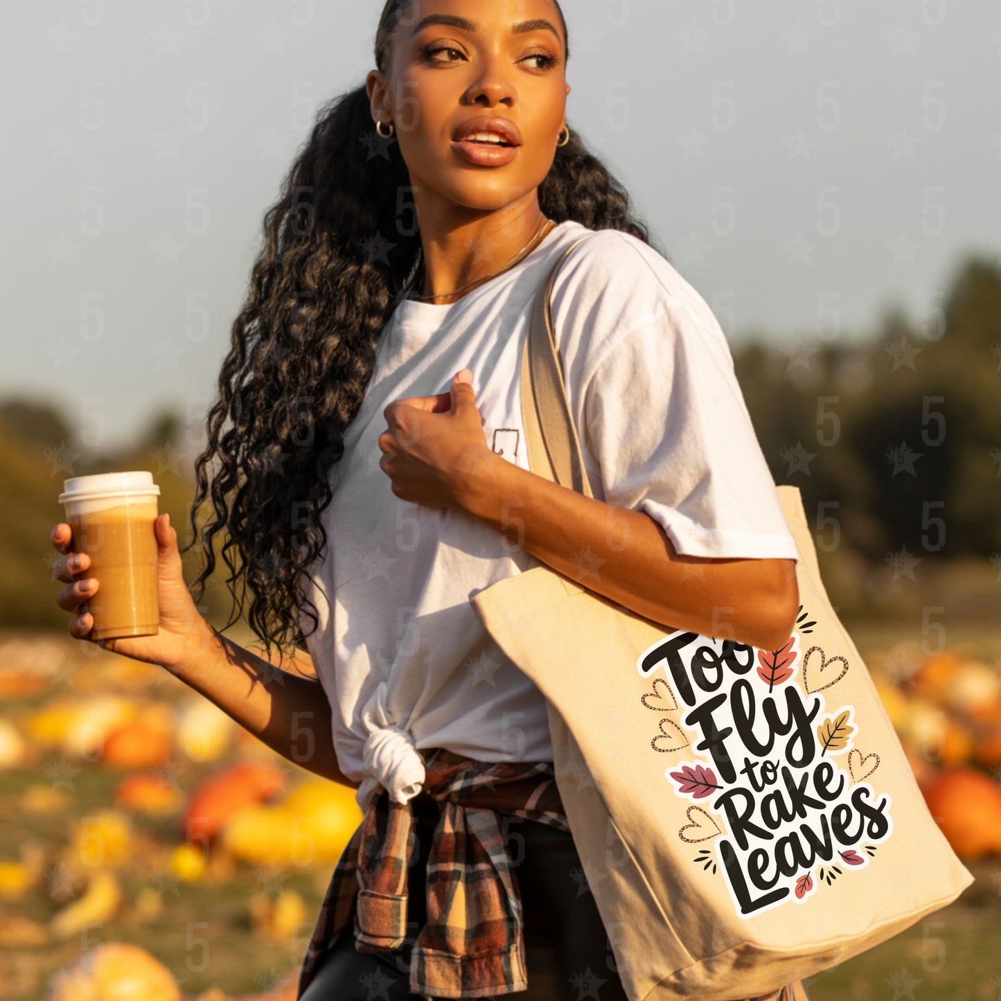 Woman holding a coffee cup and tote bag with text in a pumpkin patch