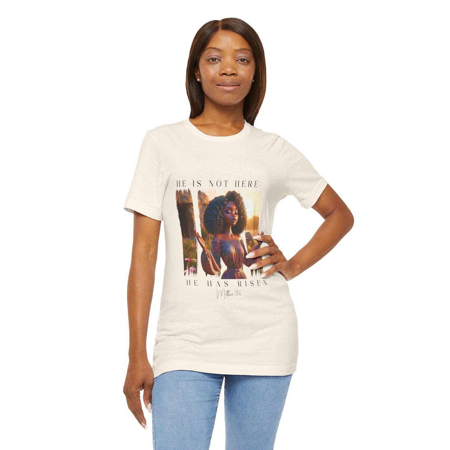 Woman wearing a beige t-shirt with a 'He is Not Here' design and text on a white background