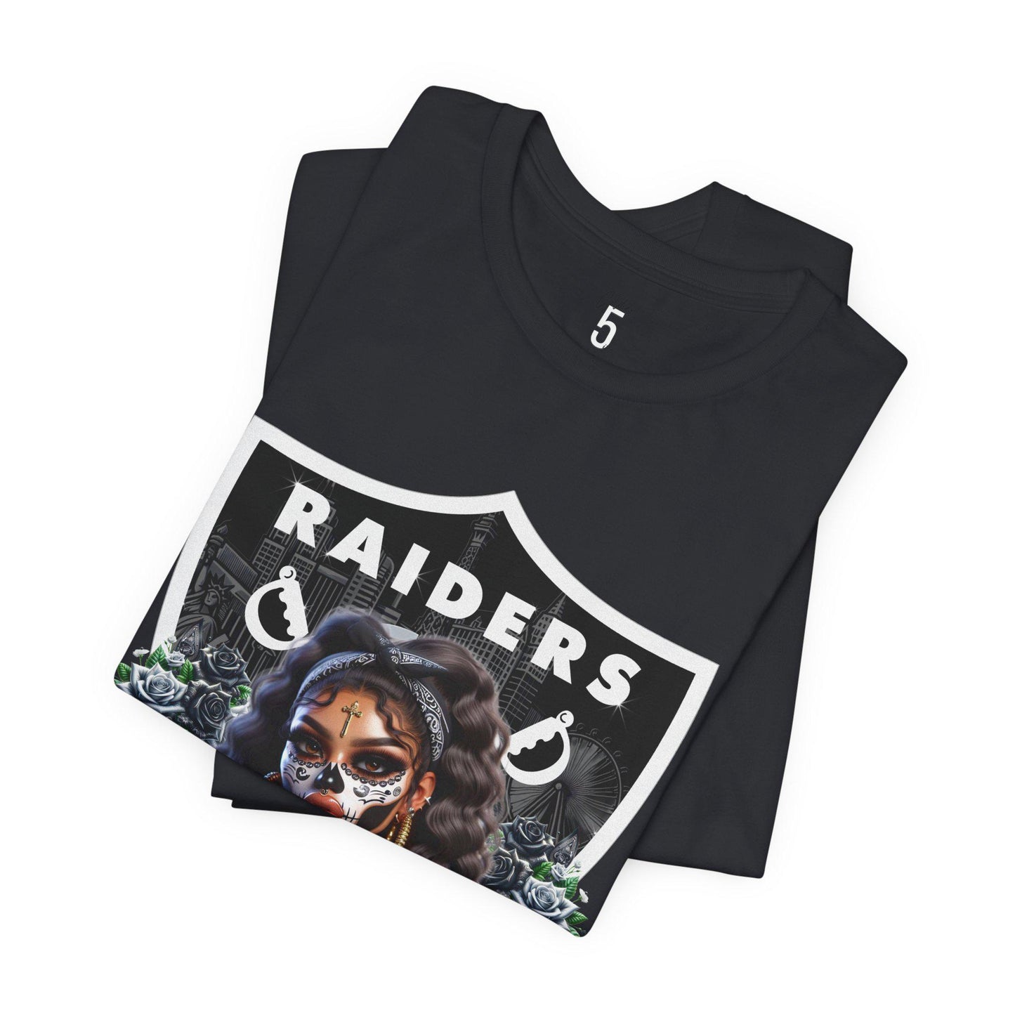 Black t-shirt with a dia de los muertos Raiders design on a white background.