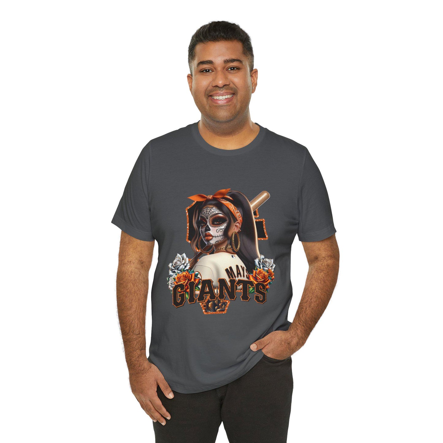 Man wearing a gray t-shirt with a sf giants dia de los muertos design on a white background