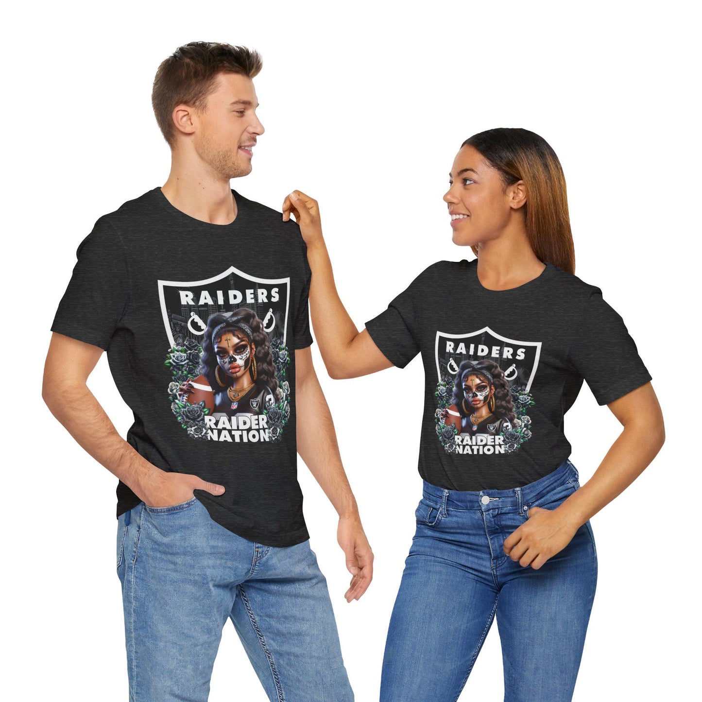 Two people wearing black t-shirts with a dia de los muertos Raiders design and text on a white background