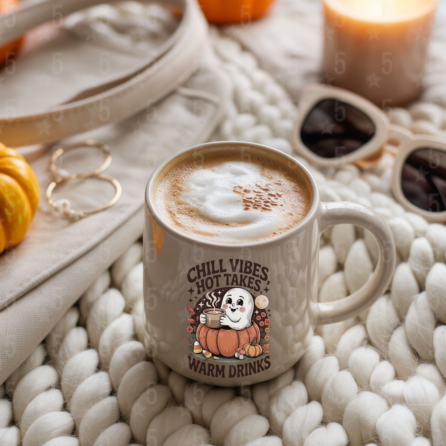 a latte mug with sunglasses and hoops on the sides