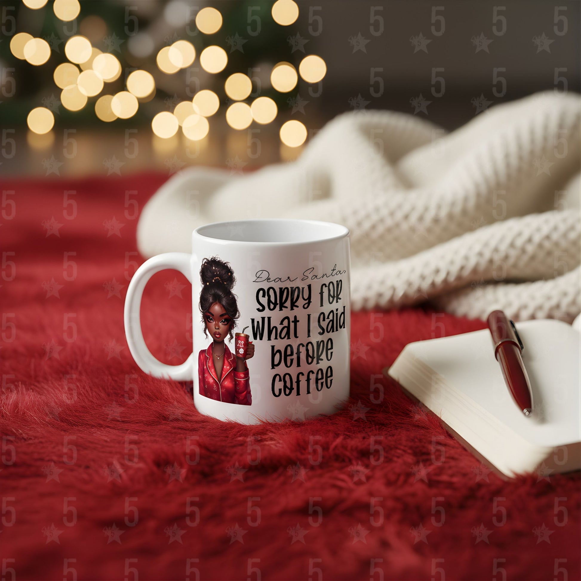 White mug with a graphic and text on a red surface with blurred lights in the background