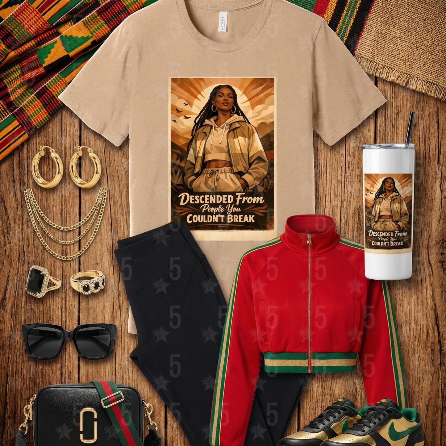 Collection of clothing and accessories with a central t-shirt featuring a graphic design.
