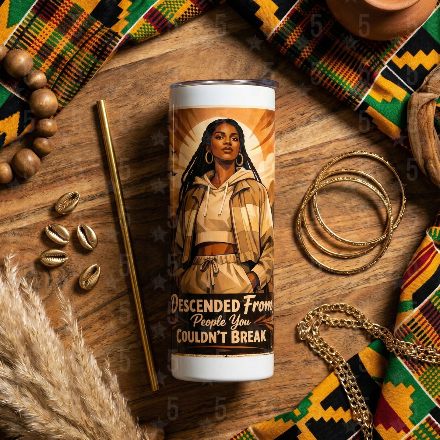 Tumbler with a design of a woman and text on a wooden surface with decorative items.