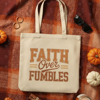 Tote bag with 'Faith Over Fumbles' text on a plaid background with pumpkins and sunglasses.