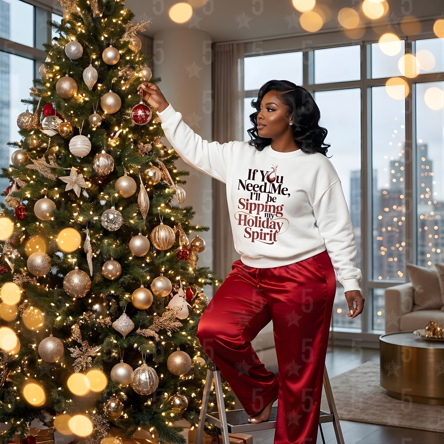 Woman decorating a Christmas tree in a room with large windows and cityscape view.