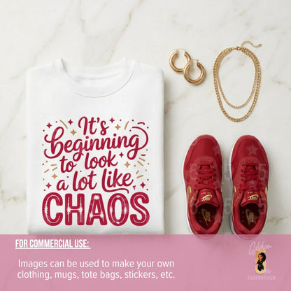 White t-shirt with 'It's beginning to look a lot like chaos' text, red sneakers, gold earrings, and necklace on a marble surface.