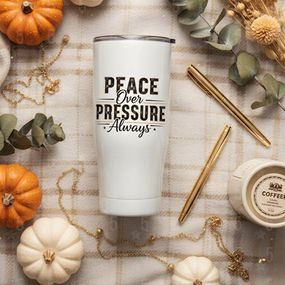 White tumbler with 'Peace Over Pressure Always' text on a fall-themed background with pumpkins and leaves.
