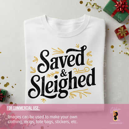 White t-shirt with 'Saved & Sleighed' text on a light gray background with decorative elements.