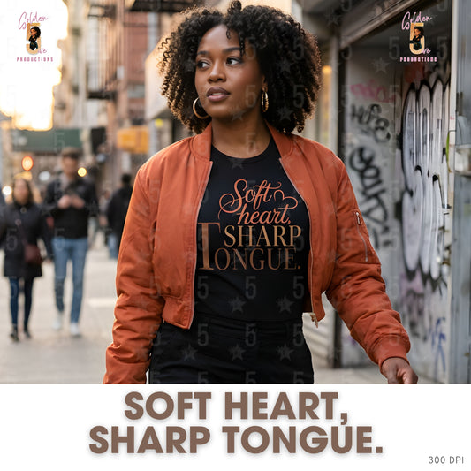 black woman in black tee with sassy saying "soft heart sharp tongue"