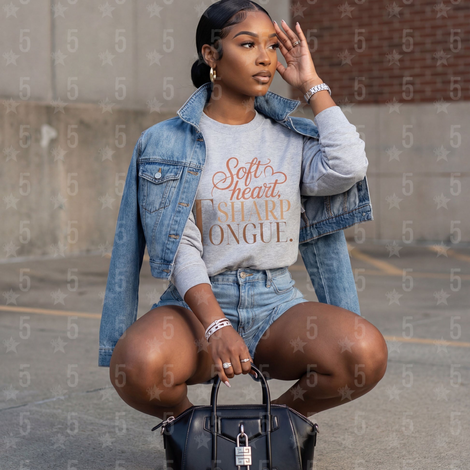 woman in grey crewnek sweater with a sassy saying