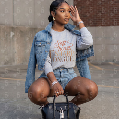 woman in grey crewnek sweater with a sassy saying