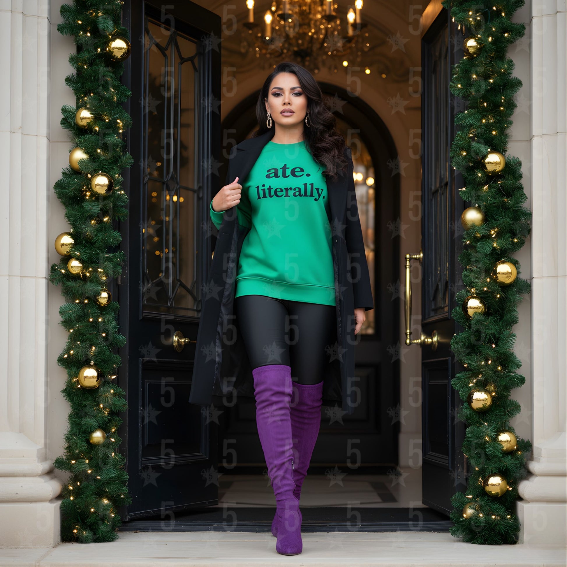 Woman in a green sweater with text, black coat, and purple boots standing in a decorated doorway.