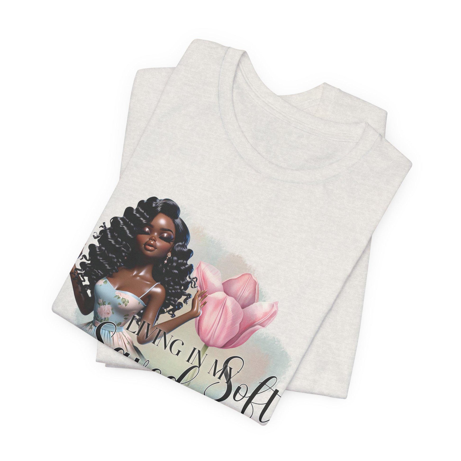 White top with a graphic of a woman and flowers 'Soft Saved Era' graphic on a white background