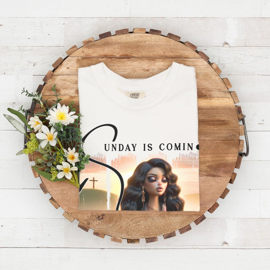 White folded top with sunday is coming design on a wooden circular tray with flowers