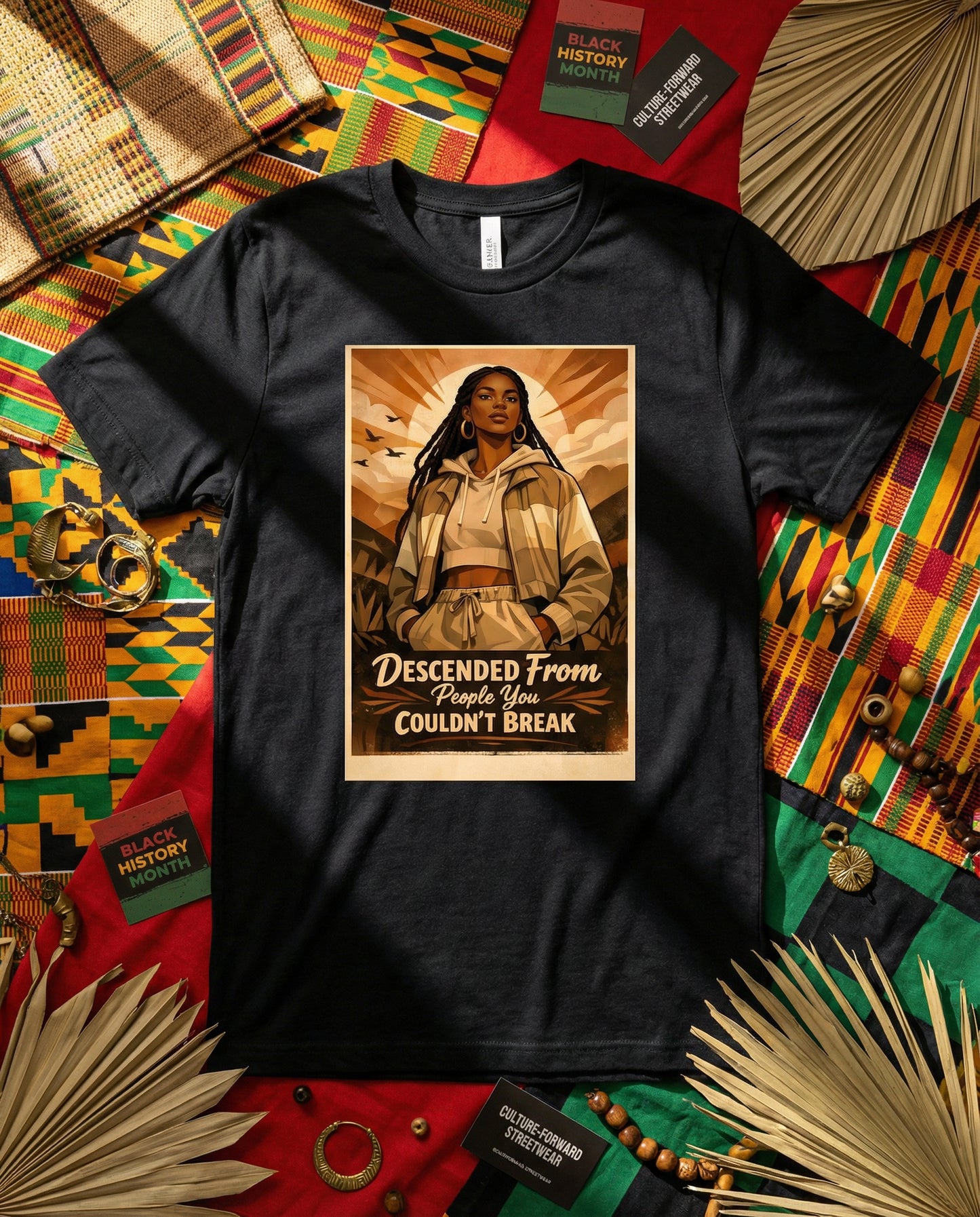 Black t-shirt with a graphic design on a colorful fabric background