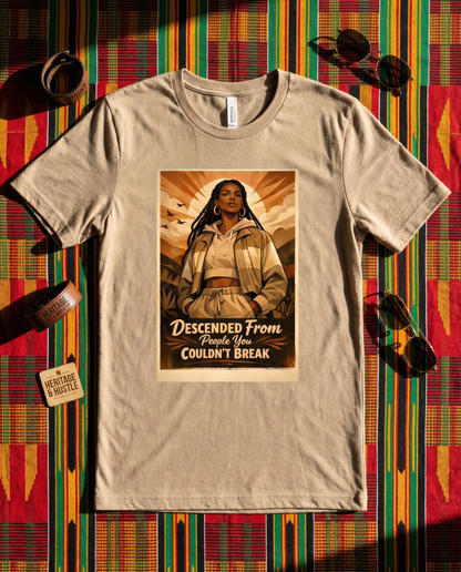 Beige t-shirt with a graphic design featuring a person and text on a colorful patterned background.