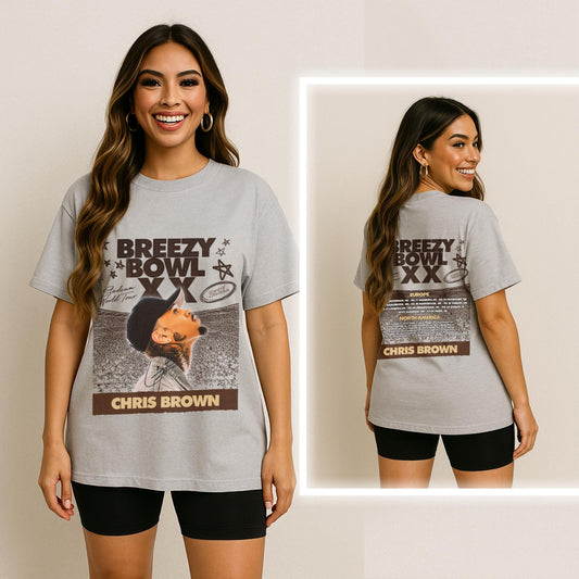 Woman wearing a gray t-shirt with Chris Brown graphic and text