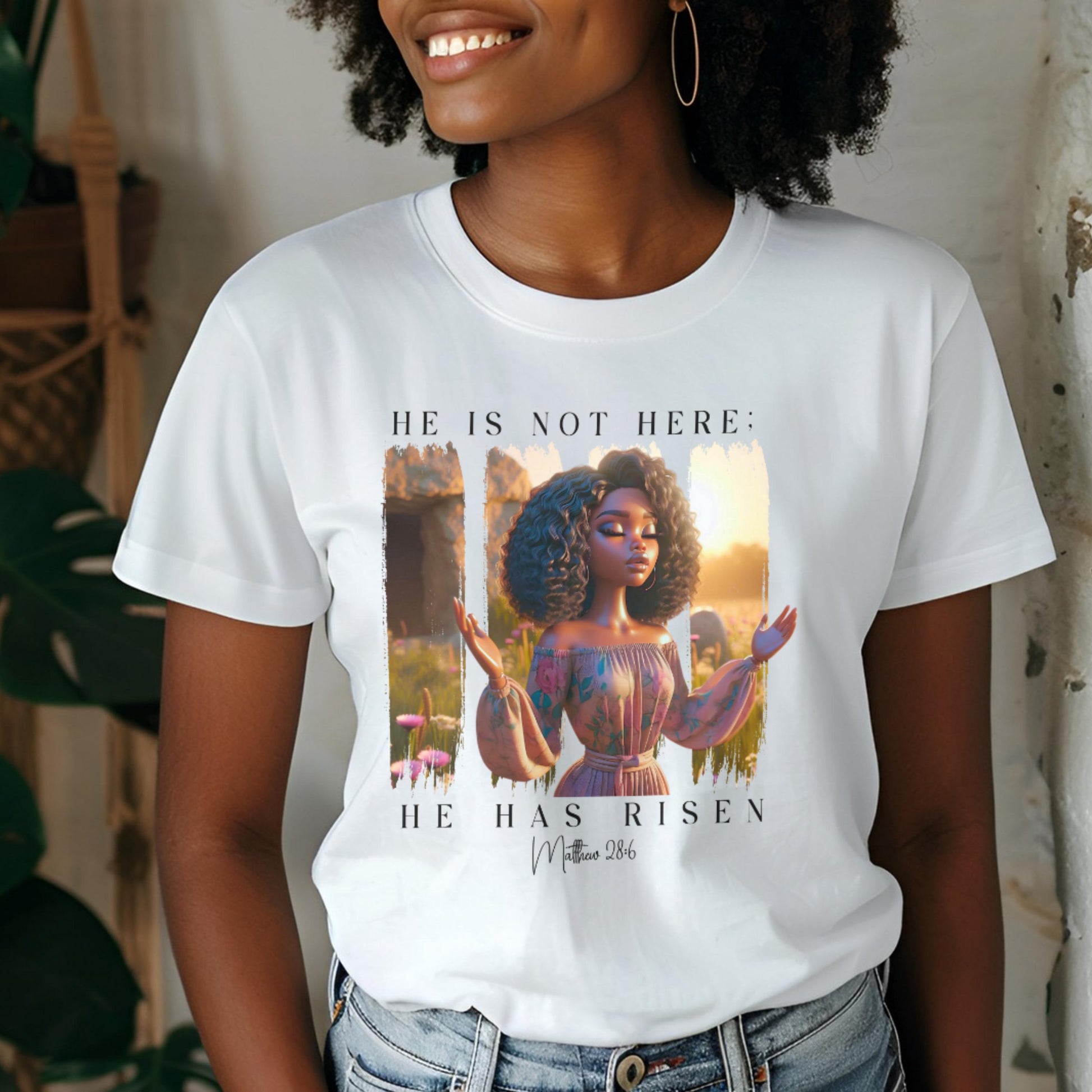 Person wearing a white t-shirt with a 'He Is Not Here' graphic.