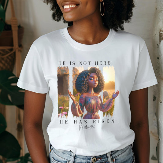 Person wearing a white t-shirt with a 'He Is Not Here' graphic.